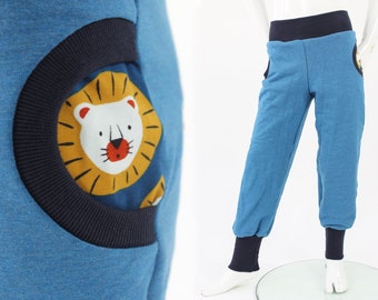 Tobe trousers for children, mottled blue with lions