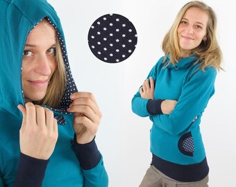 Damen-Kapuzenpulli petrol mit Punkten auf blau