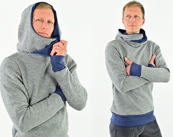 Wool sweater made of light gray and navy mottled wool, breathable, heat-regulating, dirt-repellent