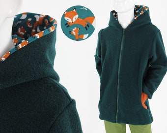 Children's wool jacket in dark green mottled with foxes on petrol