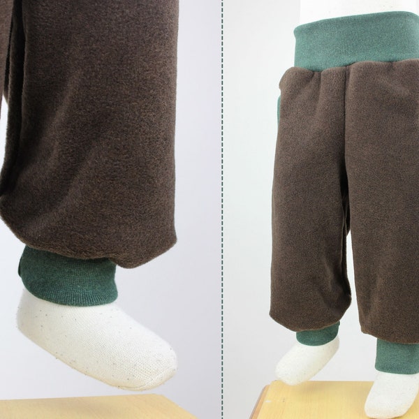 Tobe pants made of mottled brown eco-fleece, with pockets, grows with you for a long time, cuddly soft, heat-retaining and water-repellent