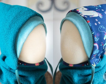 Children's reversible wool hat, turquoise with unicorns on blue, made of wool and eco-jersey, perfect for autumn and winter