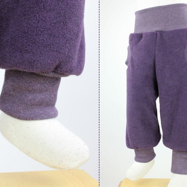 Tobe trousers made of purple mottled eco-fleece, with pockets, grows with you for a long time, cuddly soft, heat-retaining and water-repellent