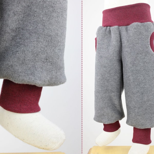 Tobe trousers made of gray mottled eco-fleece, with pockets, grow with you for a long time, cuddly soft, heat-retaining and water-repellent