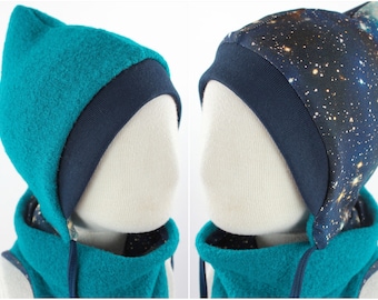 May include: Two hooded hats, one teal blue fleece with a navy blue trim and the other with a navy blue trim and a dark blue fabric with a white galaxy print.