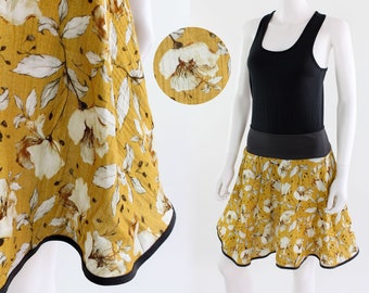 Circle skirt made of yellow eco-muslin with flowers