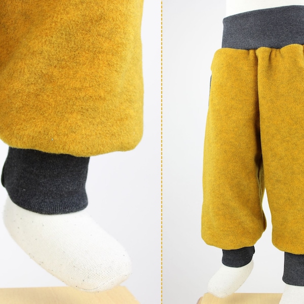 Tobe pants made of mottled yellow eco-fleece, with pockets, grows with you for a long time, cuddly soft, heat-retaining and water-repellent