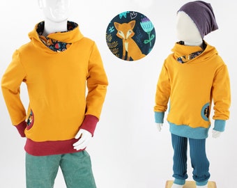 Yellow children's hoodie with foxes