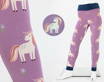 Leggings infantis rosa com unicórnios, o chifre até brilha, feitas à mão em Leipzig.