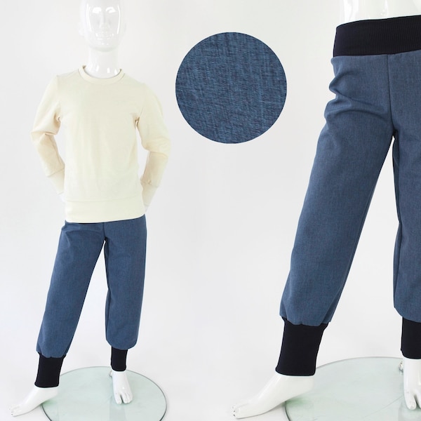 Children's softshell trousers in mottled blue with navy blue cuffs