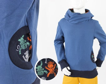 Yellow children's hoodie with foxes