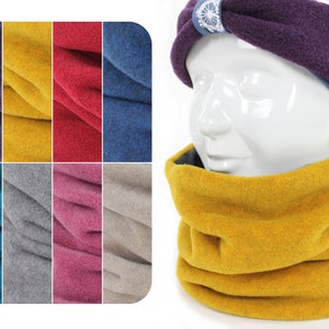 May include: A set of 10 fleece neck warmers in various colours, including purple, yellow, red, blue, teal, grey, pink, and beige. The neck warmers are folded and displayed on a white background.