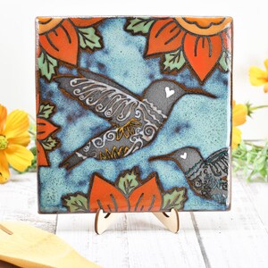 Hummingbird Ceramic Trivet Spoon Rest, Handmade Stoneware Pottery Gift in Blue, Orange, and Black