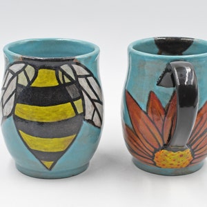 Honey Bee Pottery Mug, Handmade Ceramic Stoneware Hand Painted Cup with Sunflower in Teal Blue, Yellow and Black Stripes