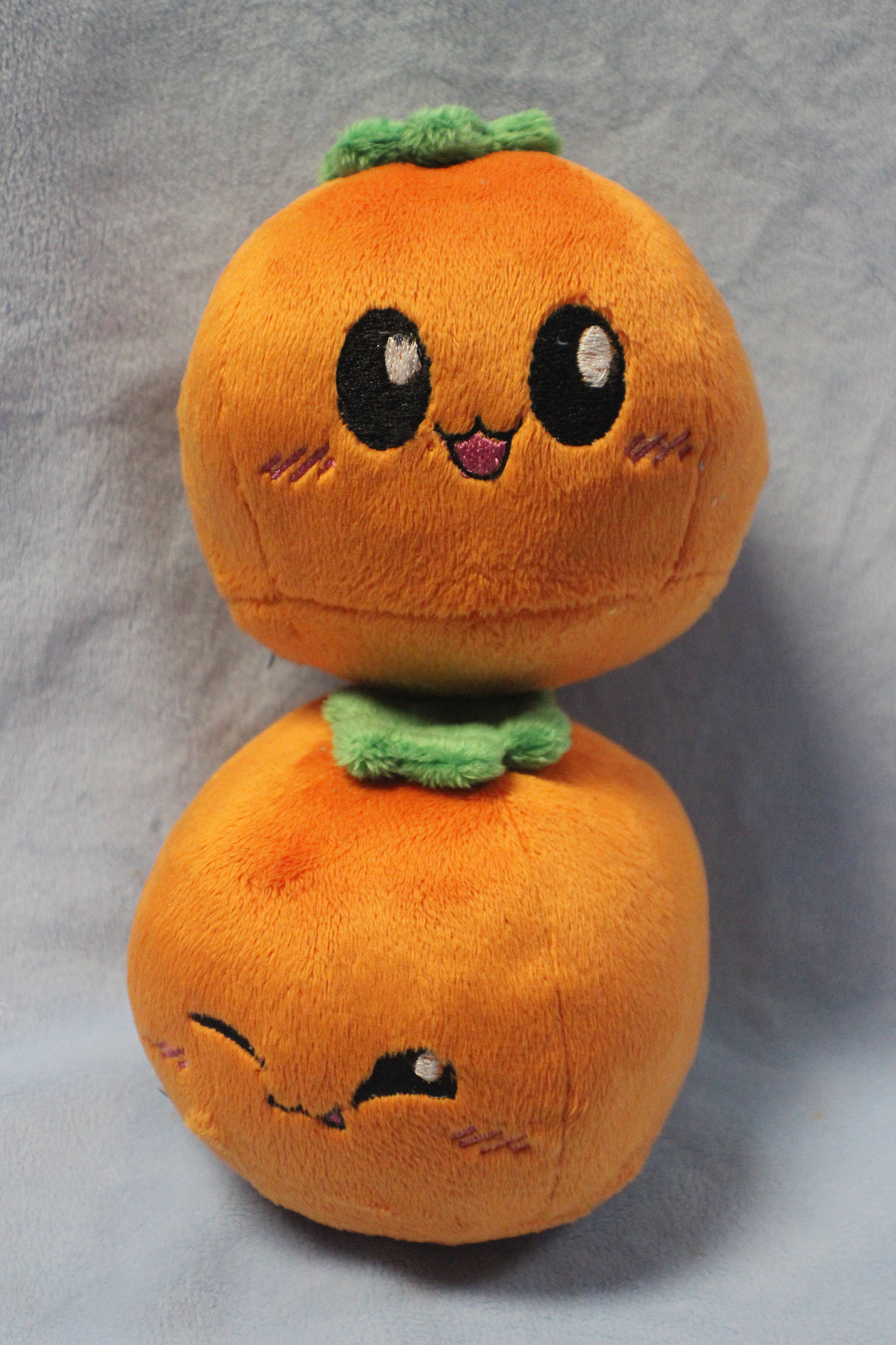 One (1) Orange Cutie Foodies Original 4