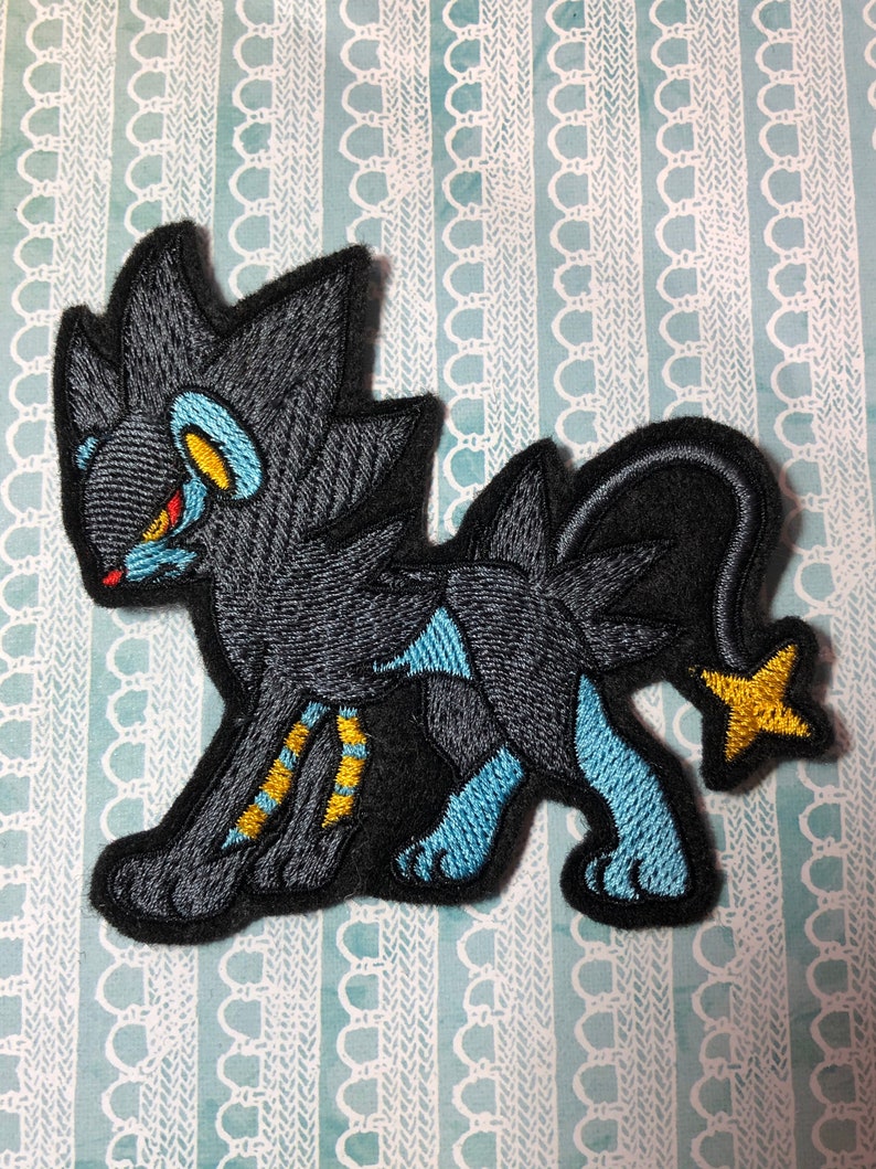 Pokemon Luxray inspired 4 lion iron-on patch
