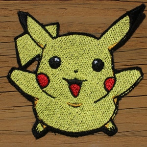 May include: Yellow embroidered patch of Pikachu, a popular cartoon character, with black outlines and red cheeks.