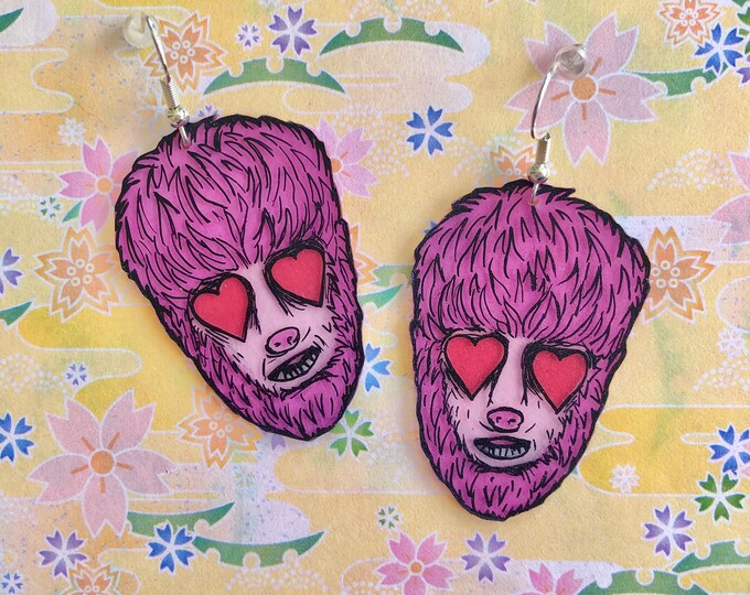 Wolfman heart eye earrings
