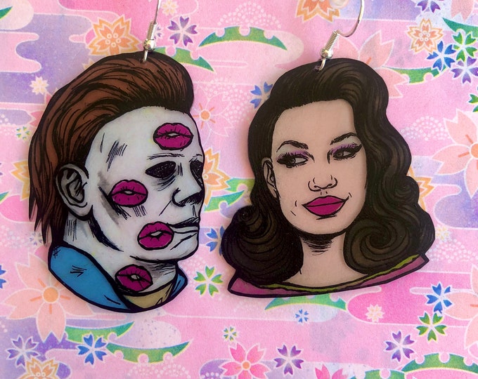 Custom romantic earrings of you and the monster of your choice!