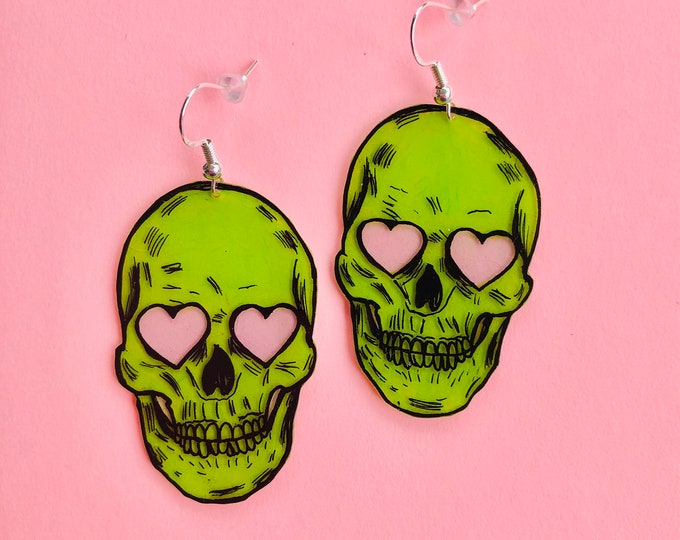 Bright green skull earrings