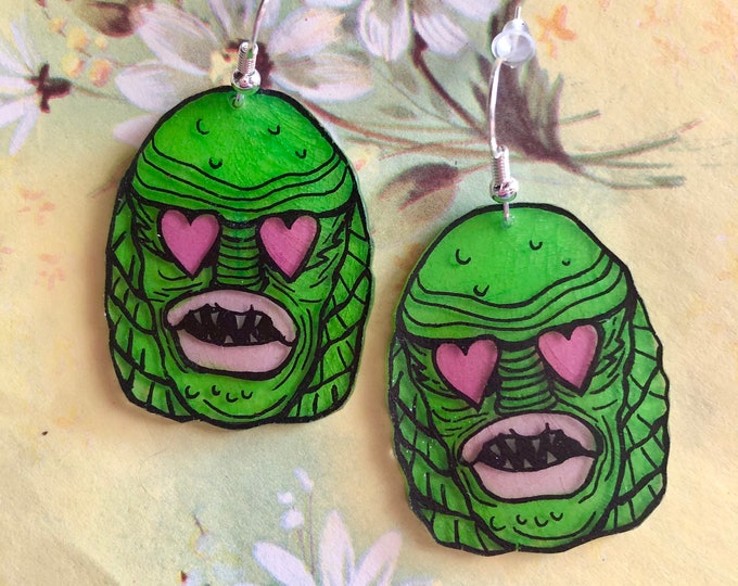 Creature heart eyes earrings