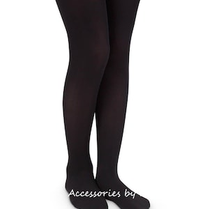 May include: Black opaque tights for women. The tights are shown on a model's legs.