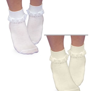 May include: Two pairs of ankle socks with lace trim. One pair is white and the other pair is ivory.