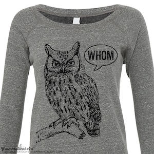 May include: A gray long-sleeved shirt with a black and white illustration of an owl with the word "WHOM" in a speech bubble above the owl.