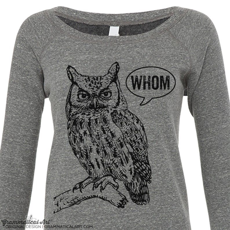 May include: A gray long-sleeved shirt with a black and white illustration of an owl with the word "WHOM" in a speech bubble above the owl.