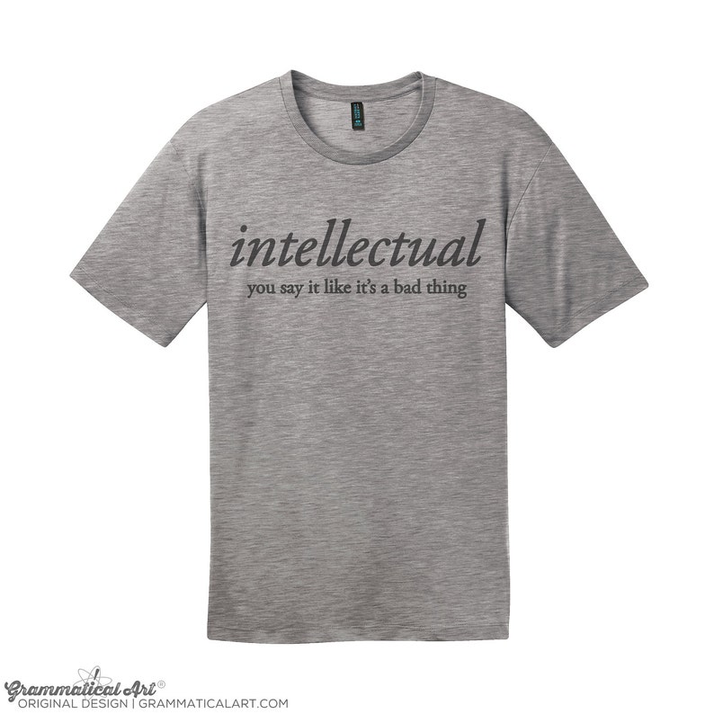 May include: A heather grey t-shirt with the text "intellectual you say it like it's a bad thing" printed in black.
