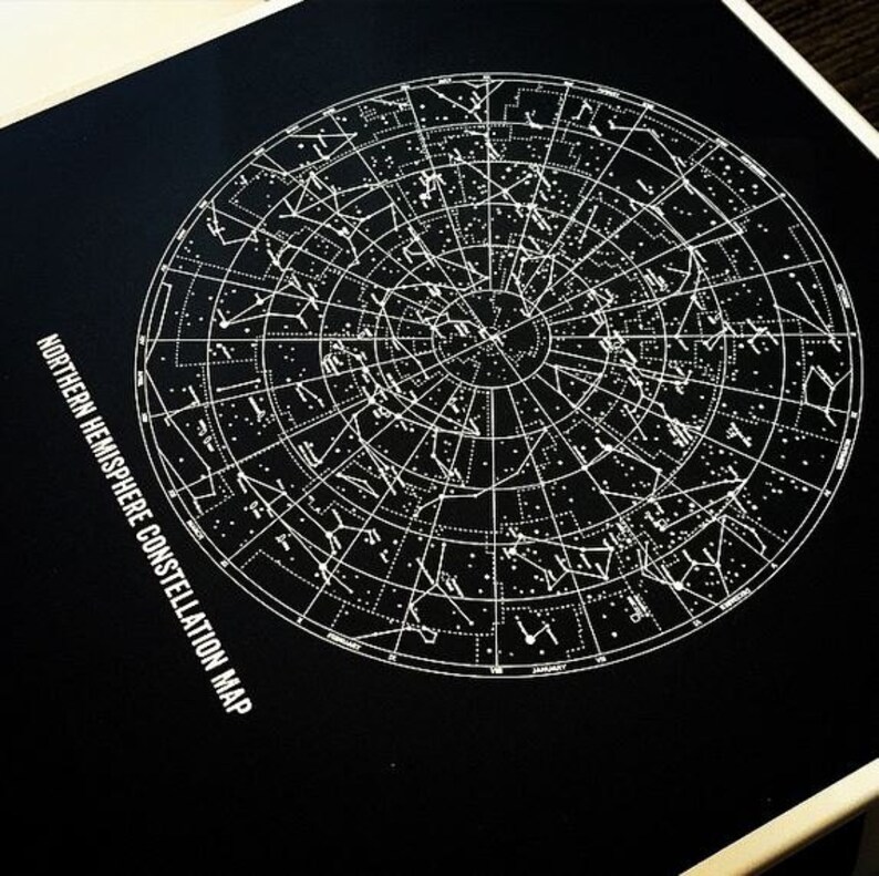 May include: A black and white star chart showing the constellations of the Northern Hemisphere. The chart is circular and includes the names of the months of the year around the edge. The text "NORTHERN HEMISPHERE CONSTELLATION MAP" is printed on the left side of the chart.