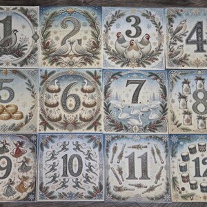 May include: A set of twelve square paper napkins featuring the Twelve Days of Christmas theme. Each napkin displays a large number from one to twelve surrounded by intricate illustrations of birds, rings, swans, dancers, pipers, and drums in blue and gold.