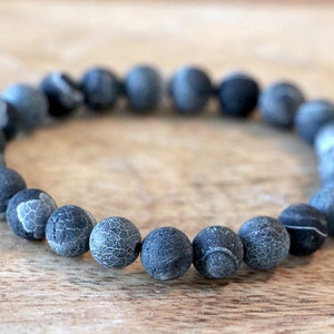 Bracelet gris d’homme de pierre