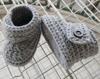 100%  cotton crochet baby booties in select colors.