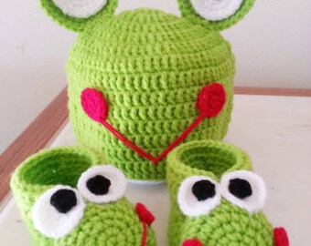 Handmade crochet baby booties and matching hat.