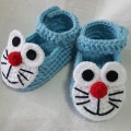 Crochet baby booties Eamon product logo
