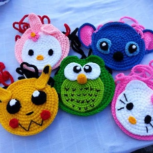 Kleines gehäkeltes Mädchen/Junge Portemonnaie