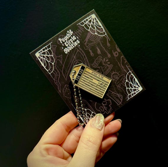 Toe Tag Enamel Pin – UV Printed Soft Enamel Pin with Metal Chain | Forensic Gothic Pin