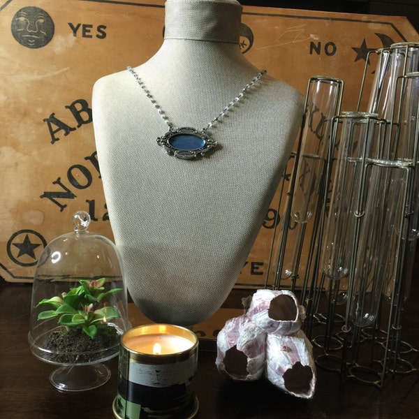 Blue morpho wing preserved on crystal and pyrite rosary chain