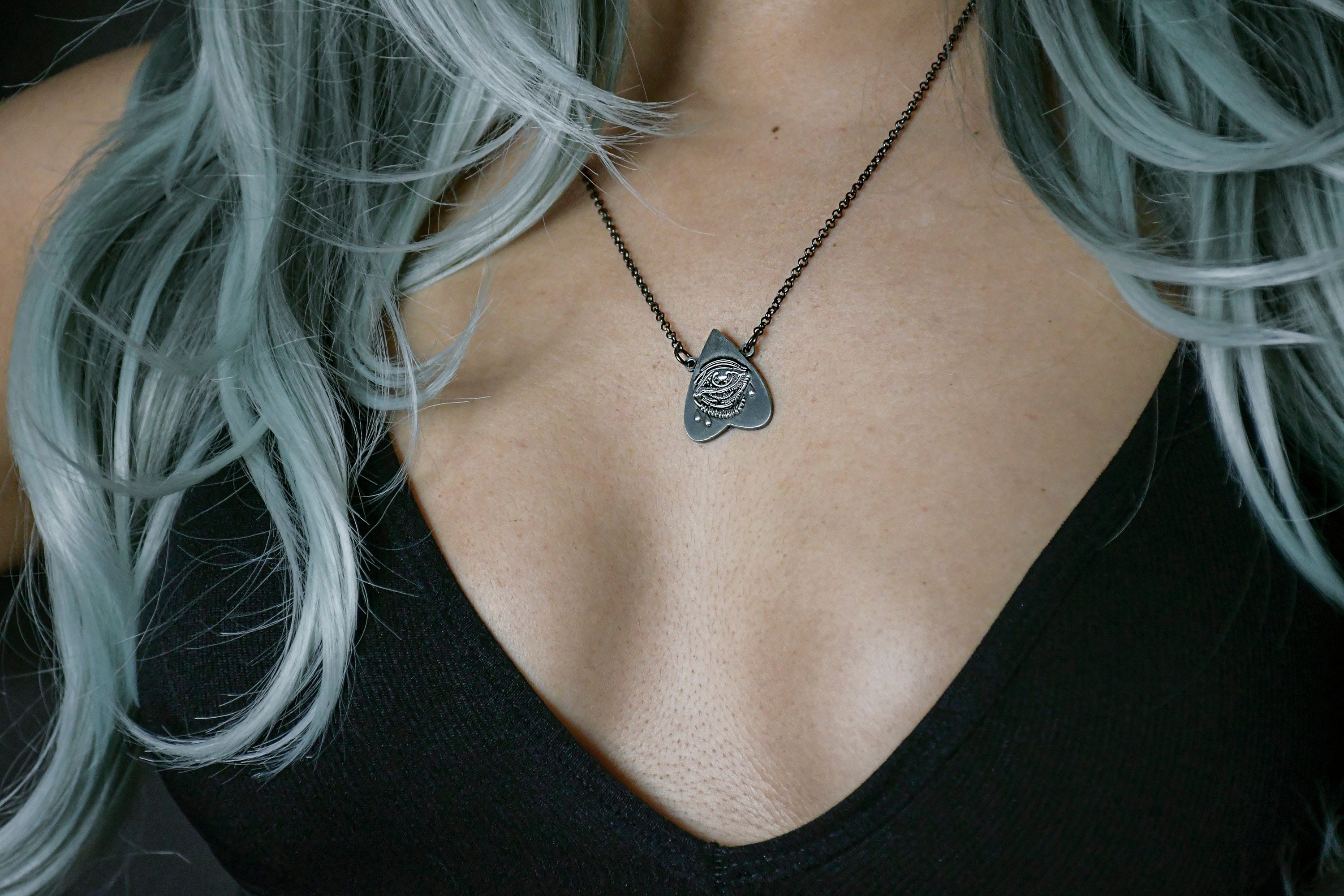All crying eye planchette necklaces 