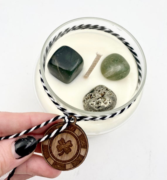 Prosperity spell candle- empowered with pyrite, aventurine, and nephrite crystals! Great witch horror occult gift!