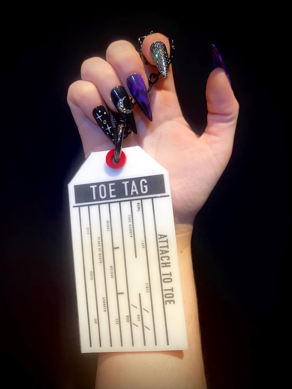 Toe Tag Purse Charm – Mortemer’s Edition- gothic horror funeral home and mortuary