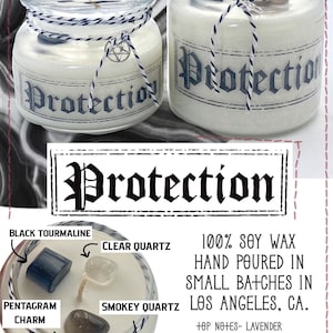 May include: A white soy wax candle in a clear glass jar with a black and white label that reads "Protection". The candle is surrounded by crystals, including black tourmaline, clear quartz, and smokey quartz. The jar is tied with a white and blue twine. The candle is hand-poured in small batches in Los Angeles, CA.