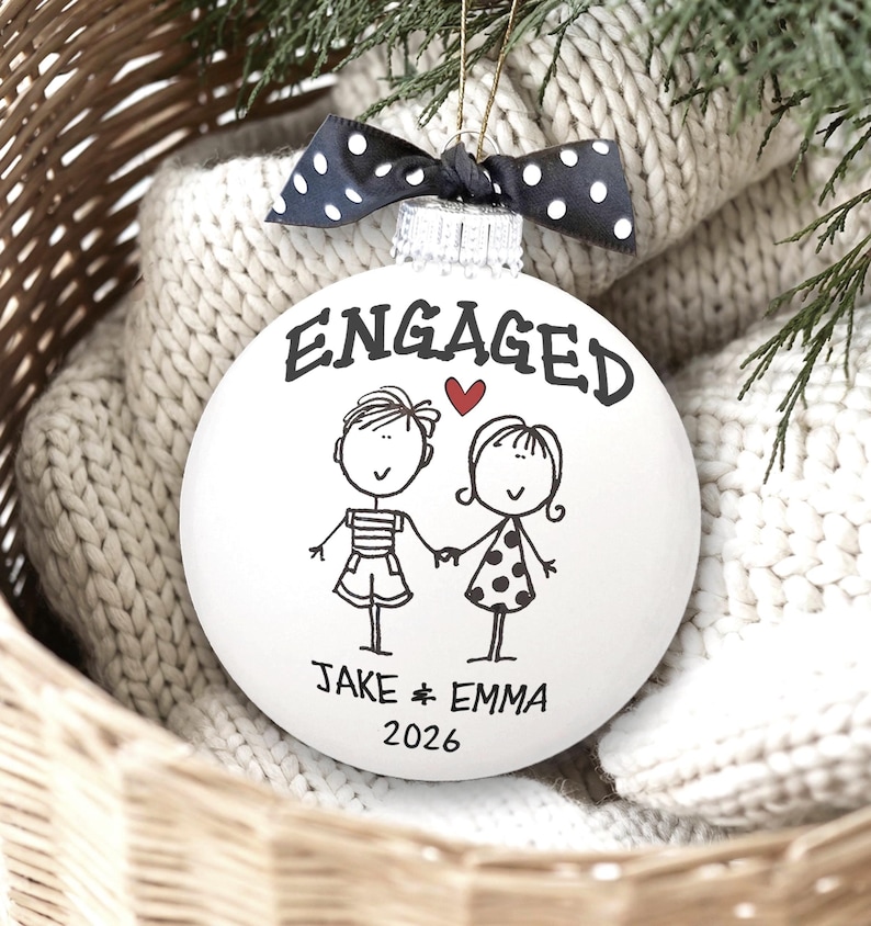 Personalized Engagement Ornament - White glass ball ornament, hand painted with whimsical couple holding hands with ENGAGED above them and names and year below. Little red heart and polka dot bow. Engaged Couple Gift Custom Names Date, Keepsake Bridal Shower Present
