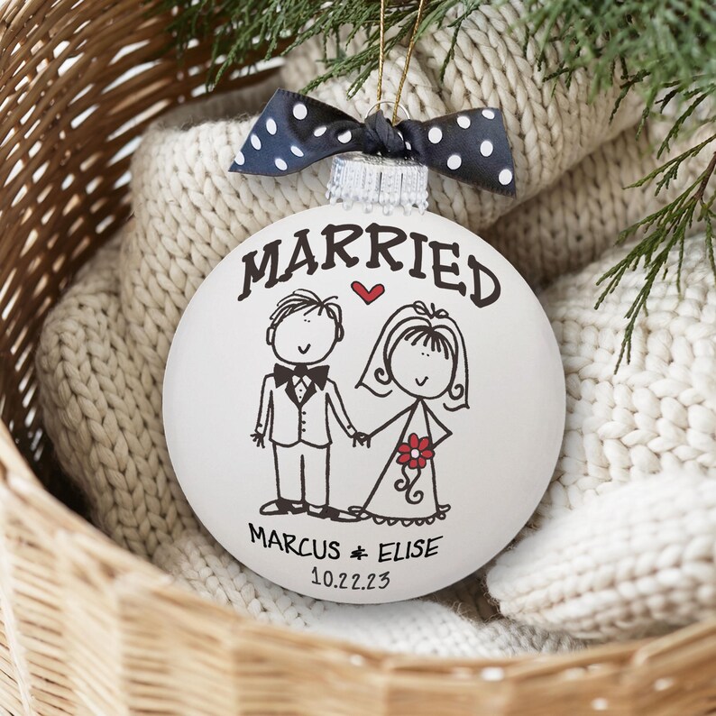 Personalized Wedding Gift Married Ornament - Hand painted white glass ball ornament with whimsical bride & groom. "Married" above figures, first names & date below. Polka dot bow attached. First Christmas Newlyweds Bridal Shower Gift Bride Groom Ornament