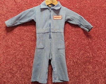 Mono de bebé de 12 meses con diseño de rayas de nogal vintage de los años 70 muy bonito