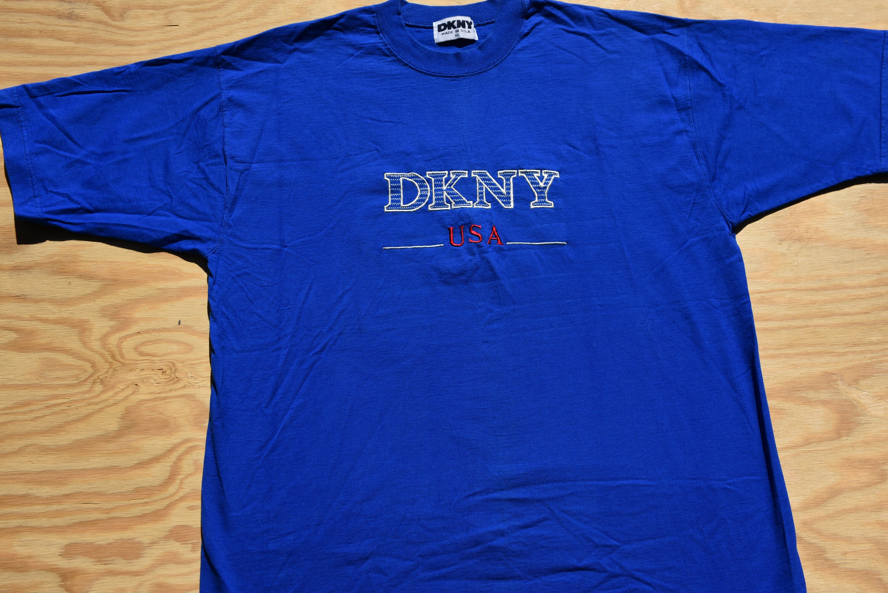 トップス DKNY Print Tee MADE IN USA vintage DKNY USA graphic tee t-shirt mens OSFA 90s 100