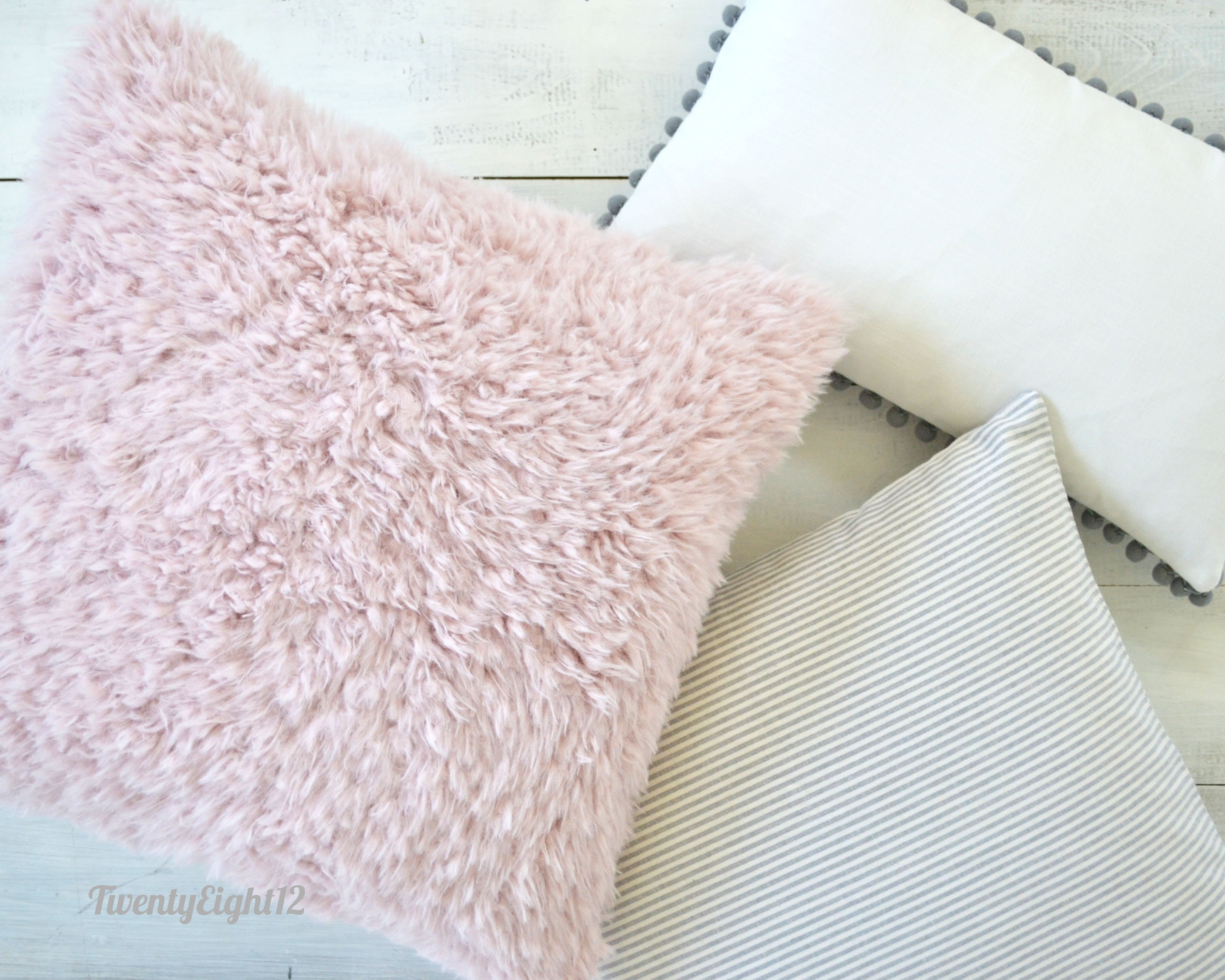 blush fur pillow