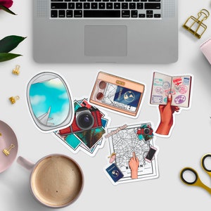 May include: A set of travel-themed stickers featuring a passport with stamps, a camera, a map, an airplane window, and a passport holder. The stickers are on a white background.