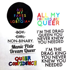 May include: A set of eight colorful stickers with messages about LGBTQIA+ pride. The stickers feature phrases like "All My Friends Are Queer", "I'm The Drag Queen You Never Knew You Needed", and "Queer Confidence".